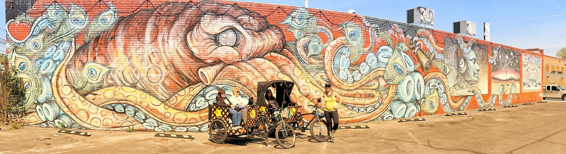 Pineapple Pedicab in front of Reno mural